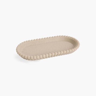 Bandeja Stripes em poliresina com textura em relevo. Design moderno e versátil, ideal para casa de banho, hall ou cómoda. 25x13 cm.