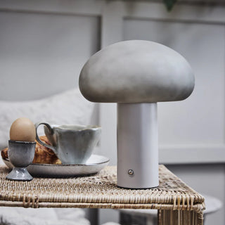 Candeeiro de mesa portátil com fio de carregar incluído, disponível em dois tamanhos S e M na cor cinza.