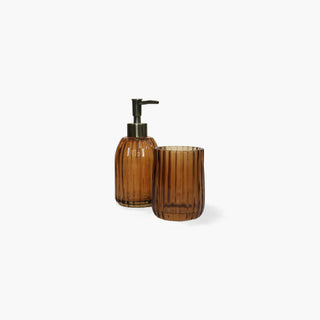 Doseador e copo porta-escovas Diamond em vidro facetado com bomba metálica dourada. Estilo glam e art déco para casa de banho sofisticada. Altura 17 cm. Combina com o copo Diamond.
